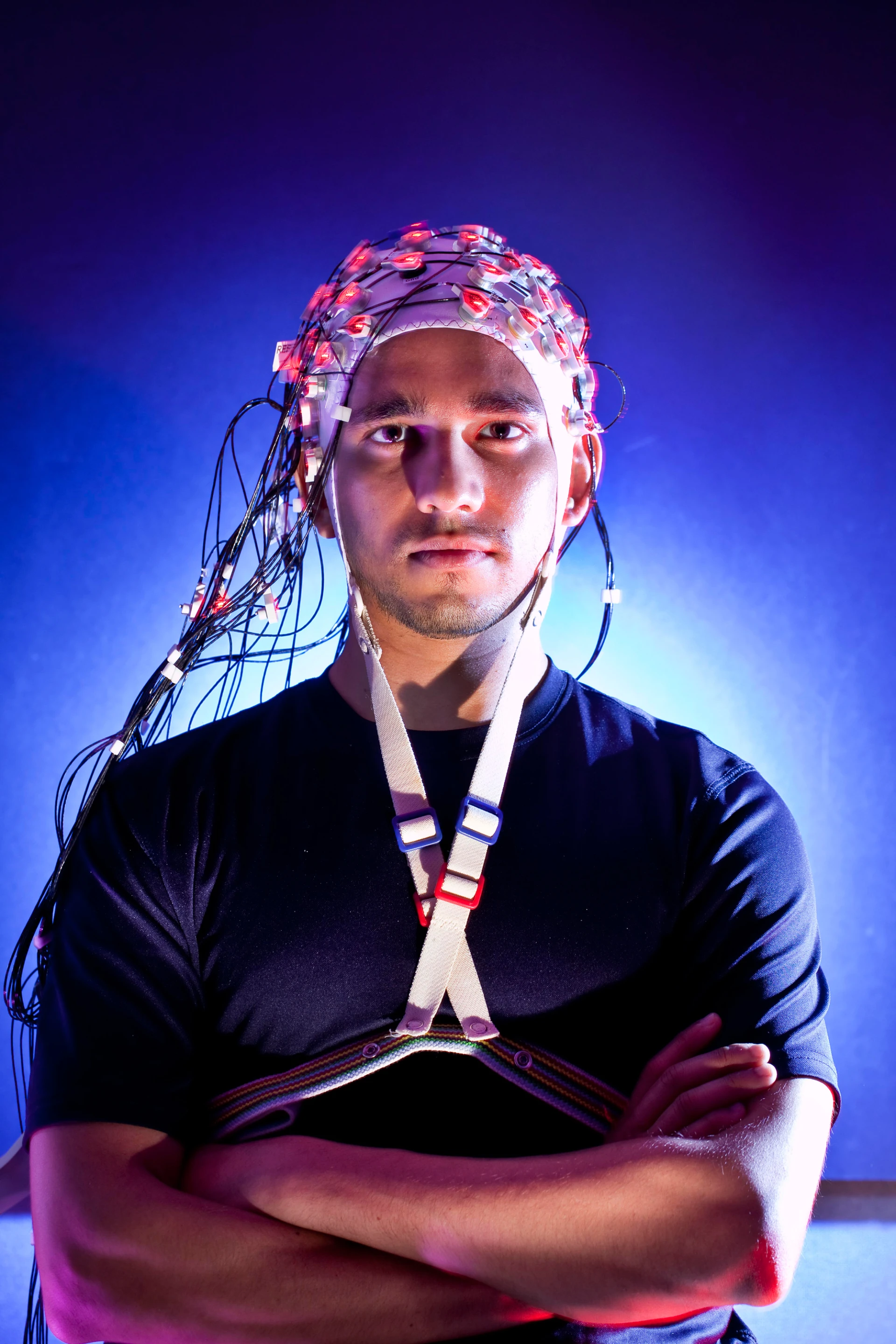 Harsha Agashe, a Ph.D. student in Contreras-Vidal's lab at UMD wears the Brain Cap, a non-invasive, sensor-lined cap (Image: John Consoli, University of Maryland)
