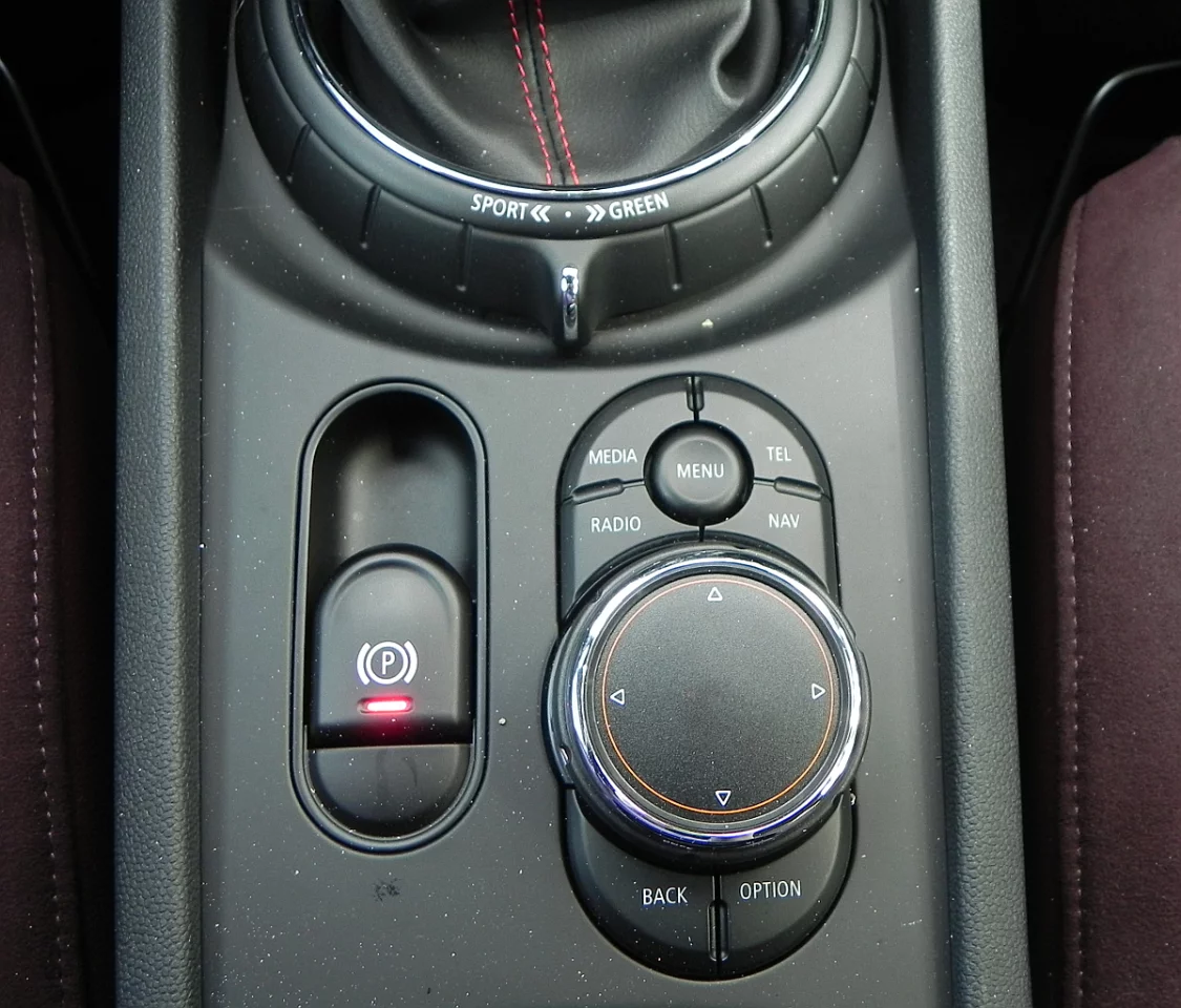 Like other BMW vehicles, the Mini’s dial-based controller has a touchpad on top and is located just forward of the center armrest for easy access