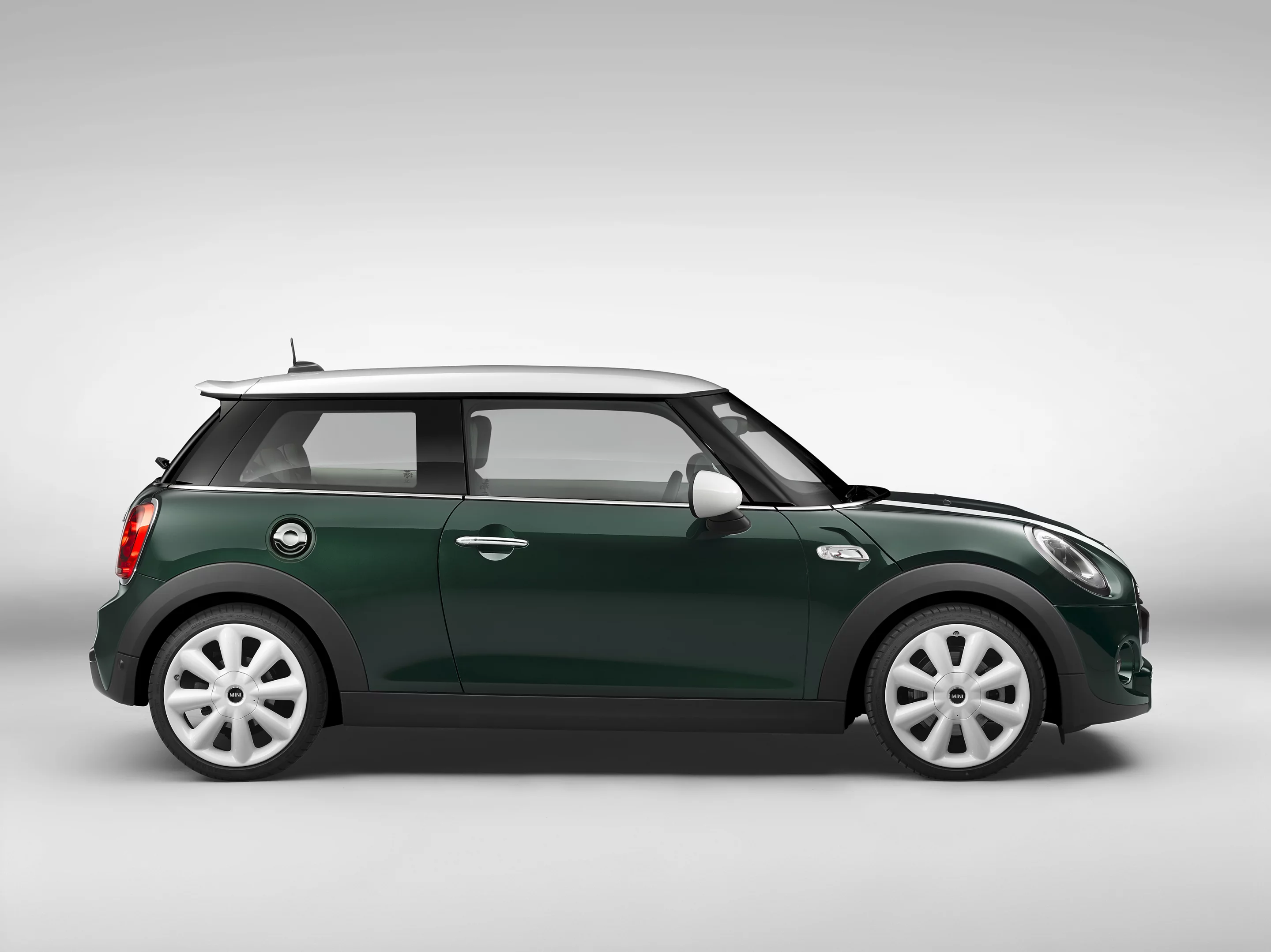 The Mini Cooper SD sports a hood scoop, big fog lights, 17-inch alloy wheels and a set of twin central tailpipes at the rear