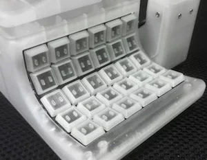 The device uses Cherry ML mechanical keyboard switches and key-mapping can be configured in-browser and stored on each device's Atmel AT90USB128 chip