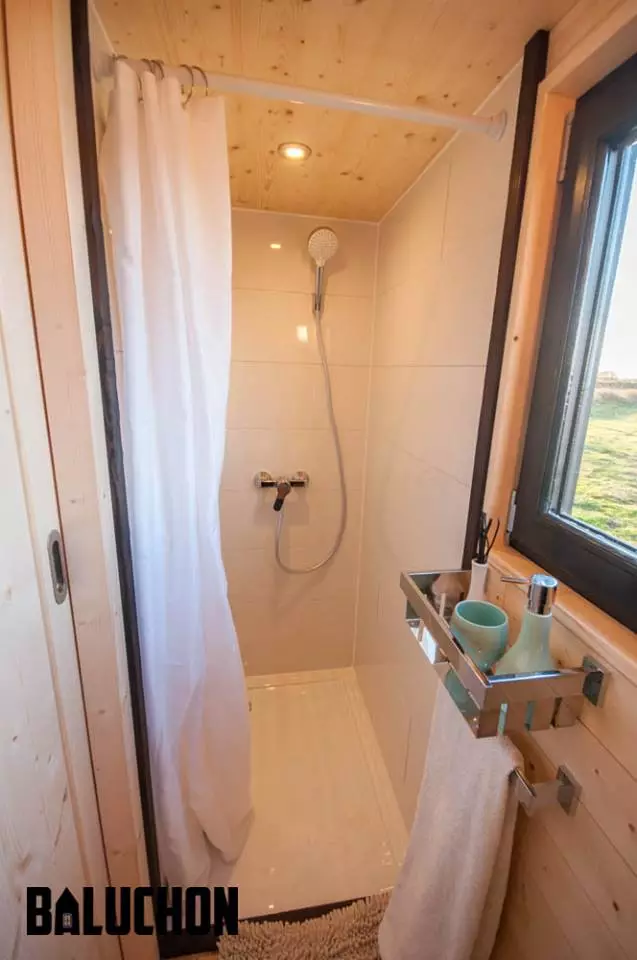 Le Petit Prince's bathroom includes a shower and toilet but no sink