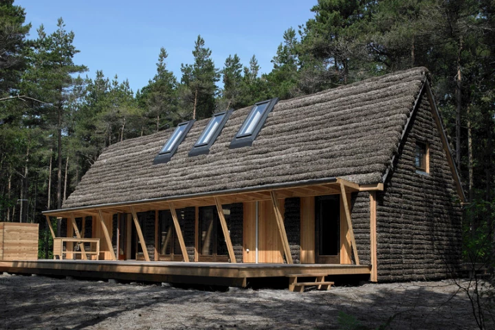 The Modern Seaweed House was constructed with timber-frame panels and stuffed with seaweed as an alternative insulation to mineral wool