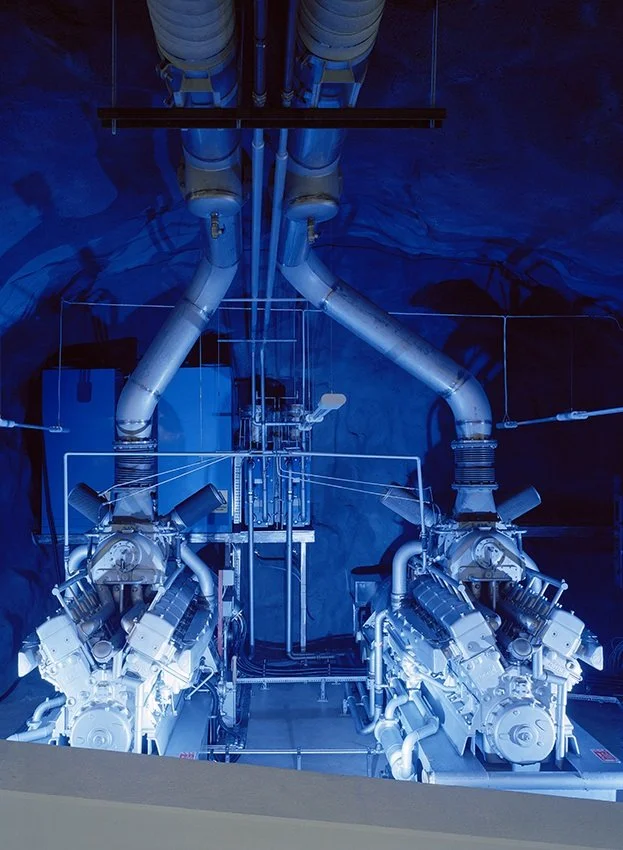 Set 30 meters underground, deep within the bedrock and in what was once used as a Swedish atomic bomb shelter, lies this high security internet center (image from AF-L)
