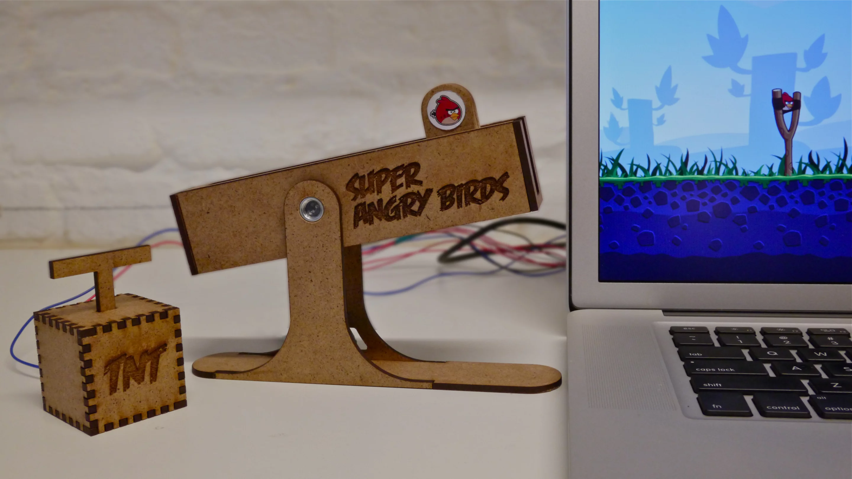 Two students designed a slingshot-style controller just for Angry Birds out of a motorized slider from a sound mixer and an Arduino microcontroller