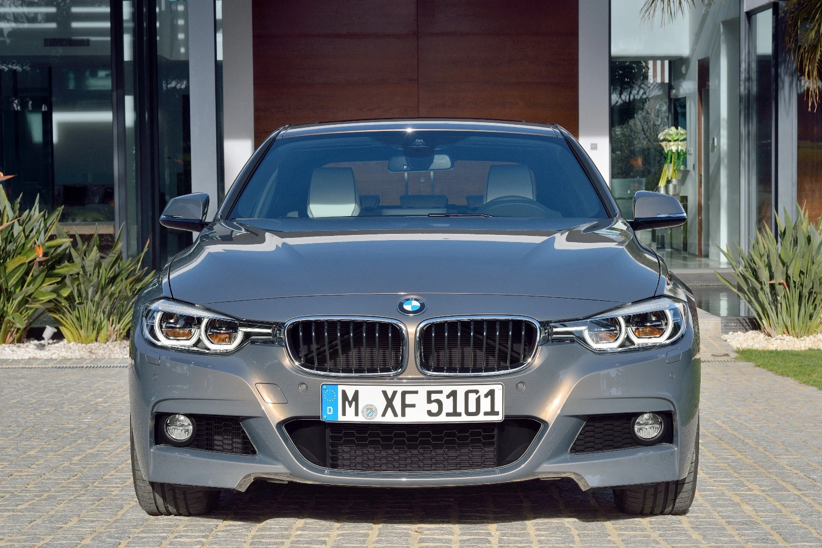 The front apron has been revised to include the sensor for BMW's active cruise control