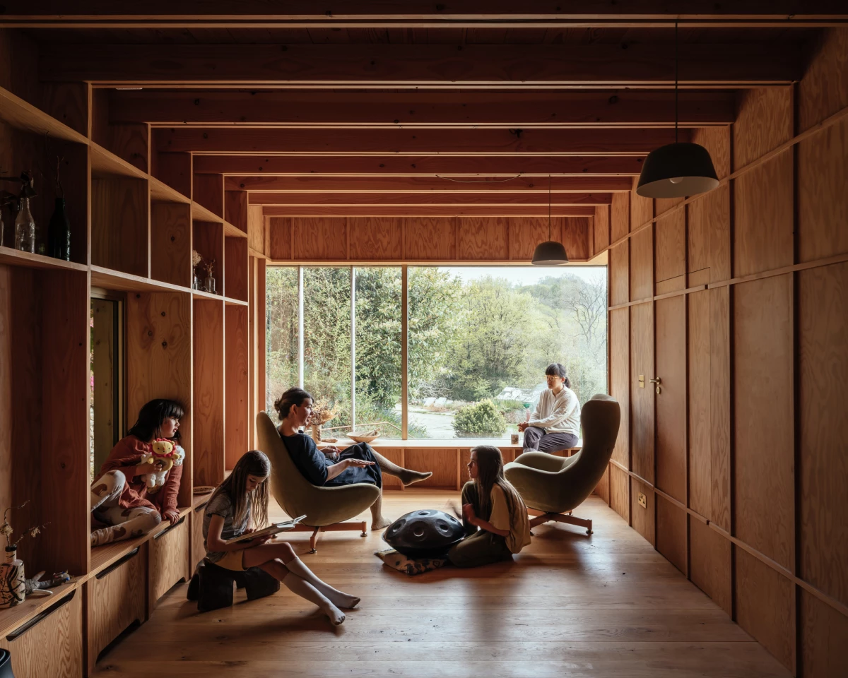 Made of Sand is a two-story home extension that adds flexible, open-plan spaces to a small cottage