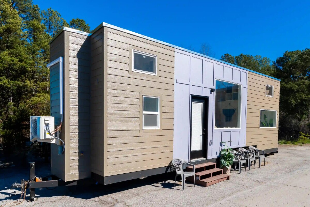 Family friendly tiny house packs three bedrooms into 32-ft layout