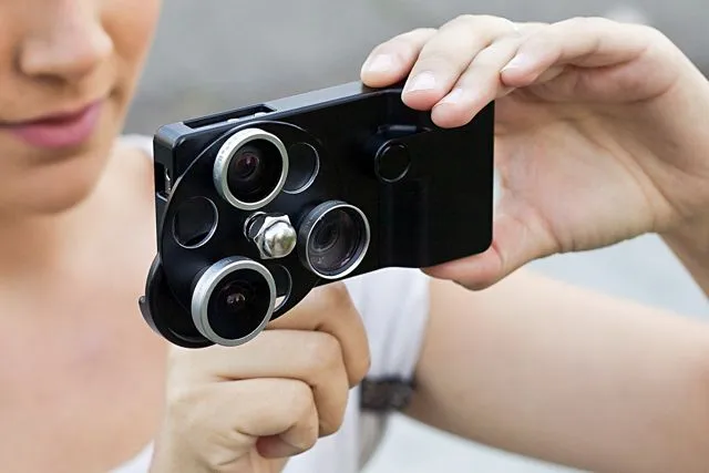 The iPhone Lens Dial features wide angle, fisheye and telephoto lenses, which swivel into place over top of the existing camera's lens