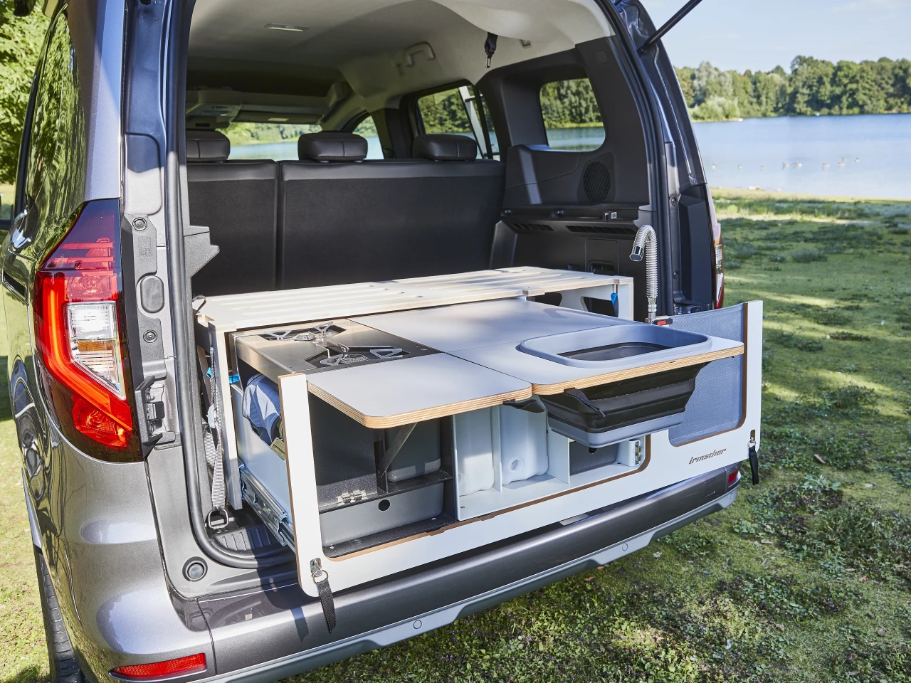 The sliding, folding Irmscher I-Box adds a kitchen to the tailgate area