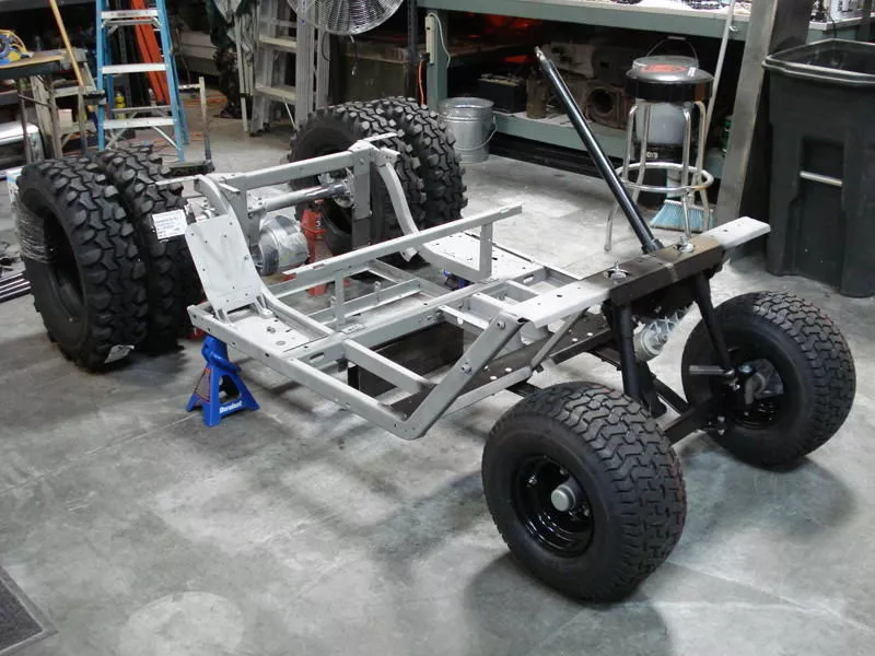 An EZ-Go golf cart was stripped down to its bare frame then hand crafted using only the finest of sheet and frame metals