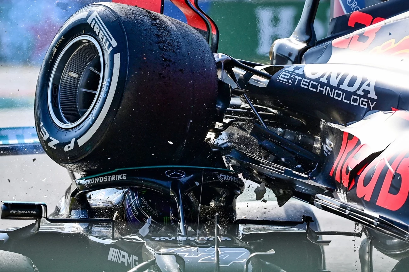 Honorable Mention - Sports. Saved by the Halo. Monza, Italy. Mercedes’ British driver Lewis Hamilton and Red Bull’s Dutch driver Max Verstappen collide during the Italian Formula One Grand Prix