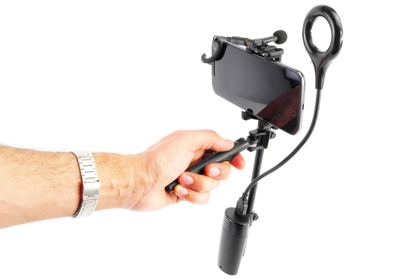 The weight of the battery is used to balance the MiniRig, while the adjustable magnet gimbal can be used to create different types of shots