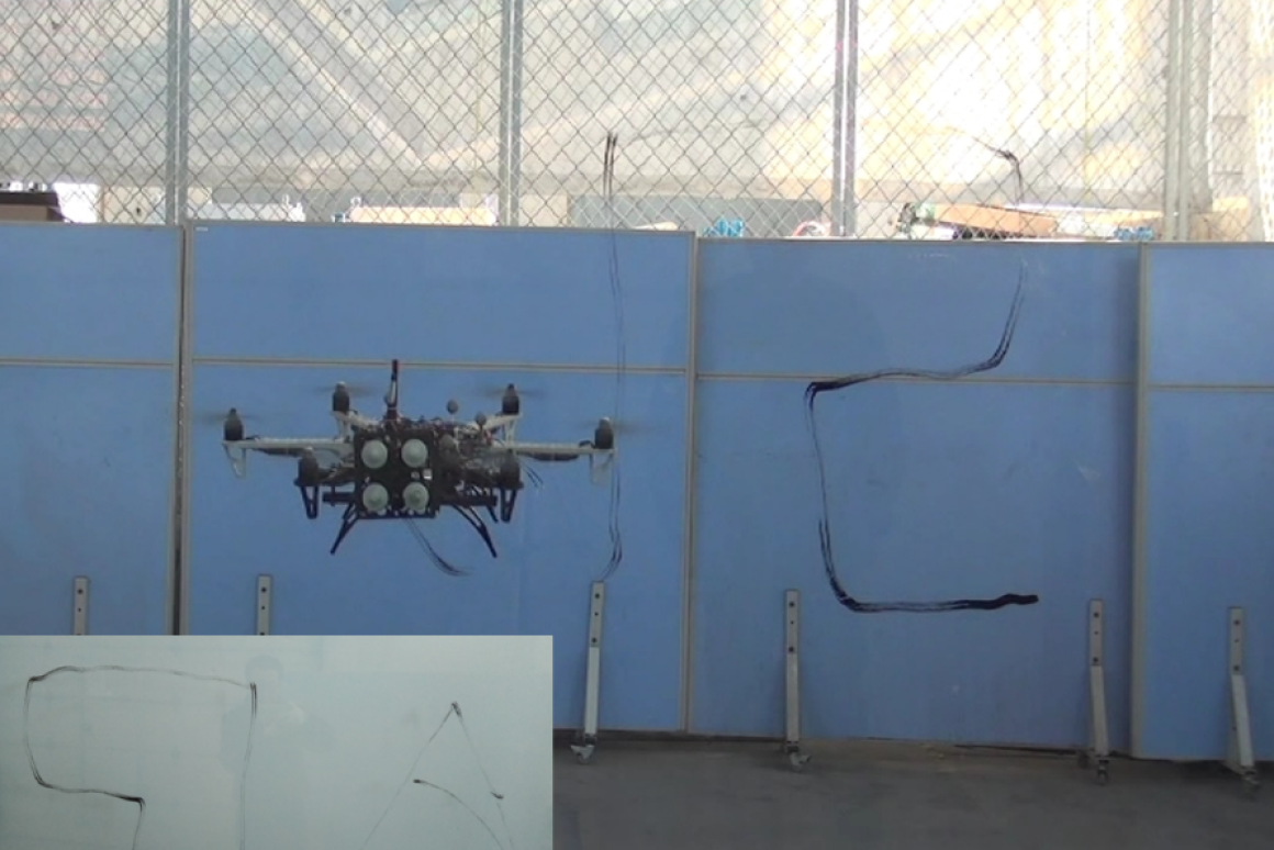 The hexacopter uses a pen in its pressure-sensing arm to write the Shenyang Institute of Automation's initials (SIA) on a glass wall