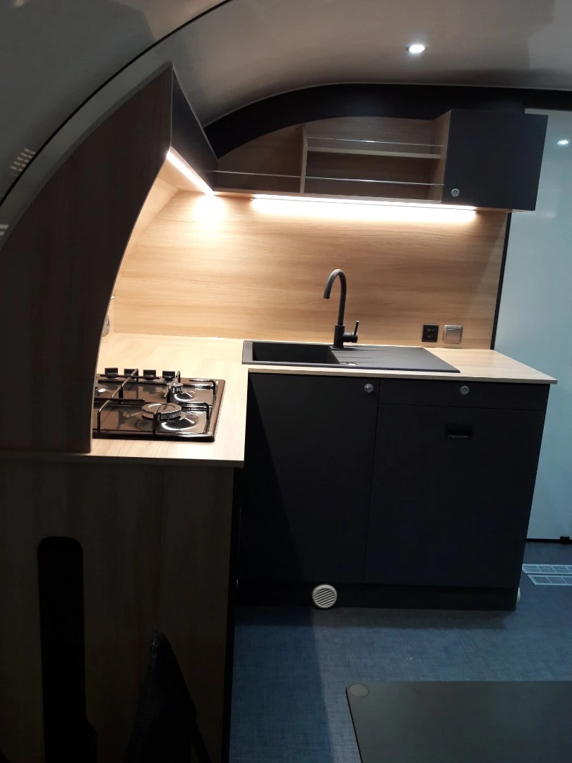 The 3X Plus uses some of its added space for a larger L-shaped kitchen