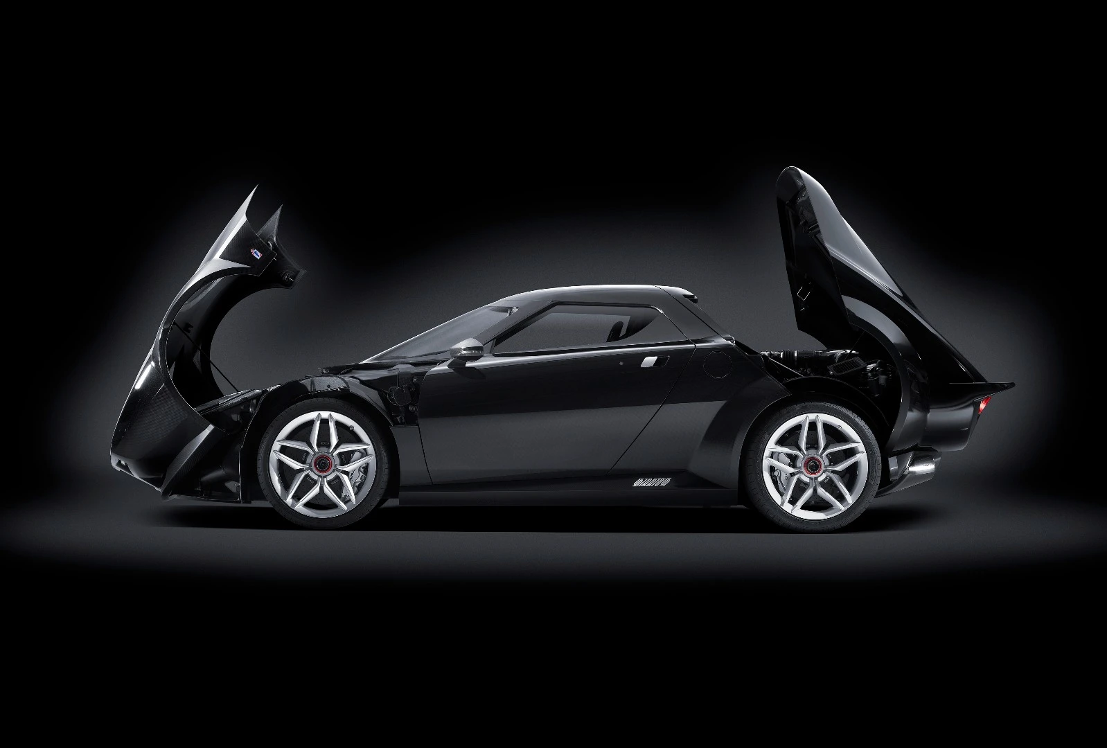 The original Stratos had removable hatches front and rear to help ease servicing during grueling rally stages