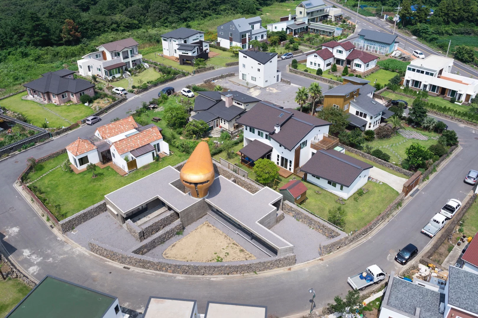 Two of the vacation homes are low-lying and echo the traditional local vernacular