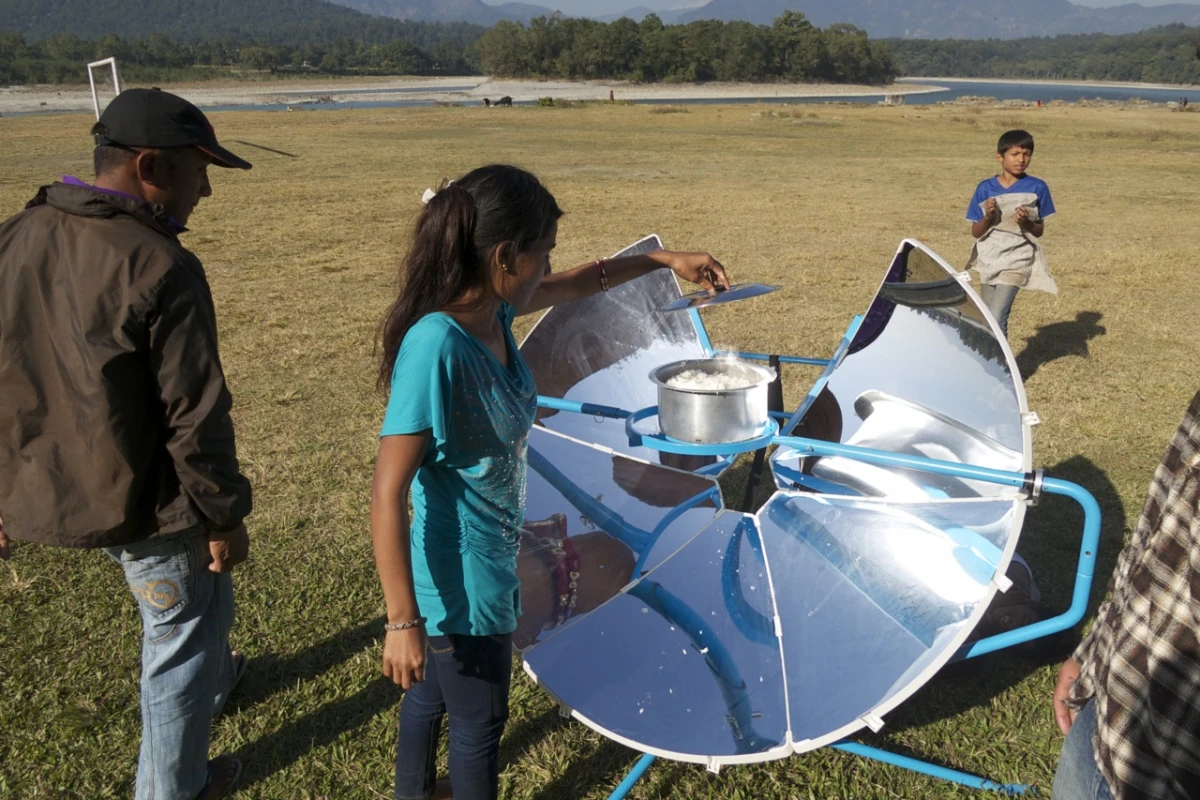 Cooking on the SolSource solar-powered grill