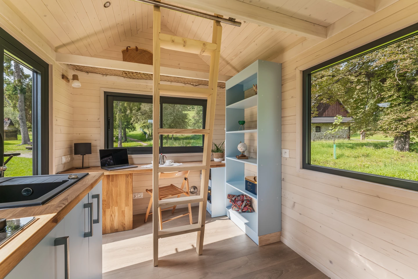 The Hirondelle's upstairs bedroom is reached by a removable wooden ladder