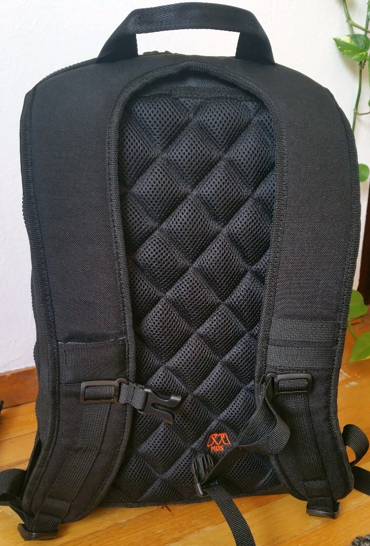 Although the shoulder straps are lean on cushioning, the MOS Pack pads the back with a breathable mesh material