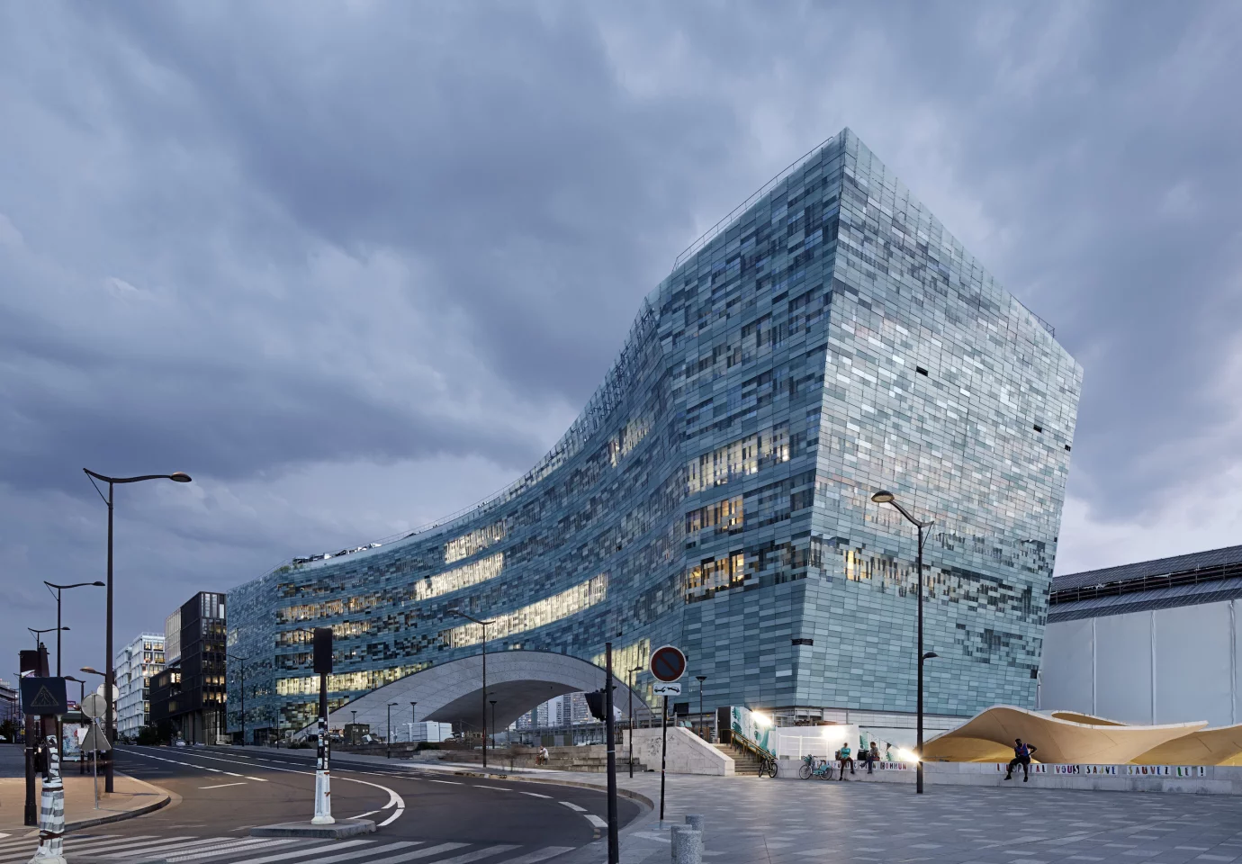 The Le Monde headquarters, by Snøhetta, features a pixelated glass facade that consists of 20,000 pieces of glass