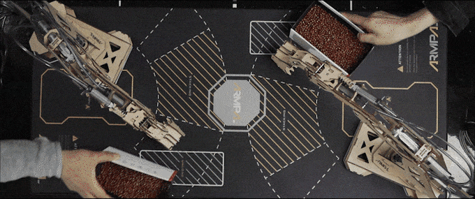 One of the suggested ArmPal games involves using the excavator bucket to scoop more beans (or sand, or whatever) into your end of the scale than your opponent does