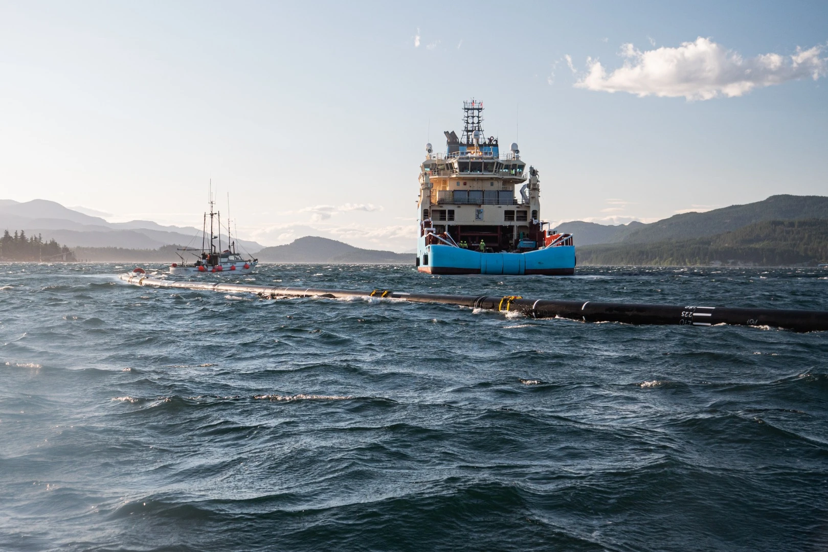 The Great Ocean Cleanup team envisions fleets of its U-shaped barrier drifting through the Great Pacific Garbage Patch eating up plastic waste like a giant Pac-Man