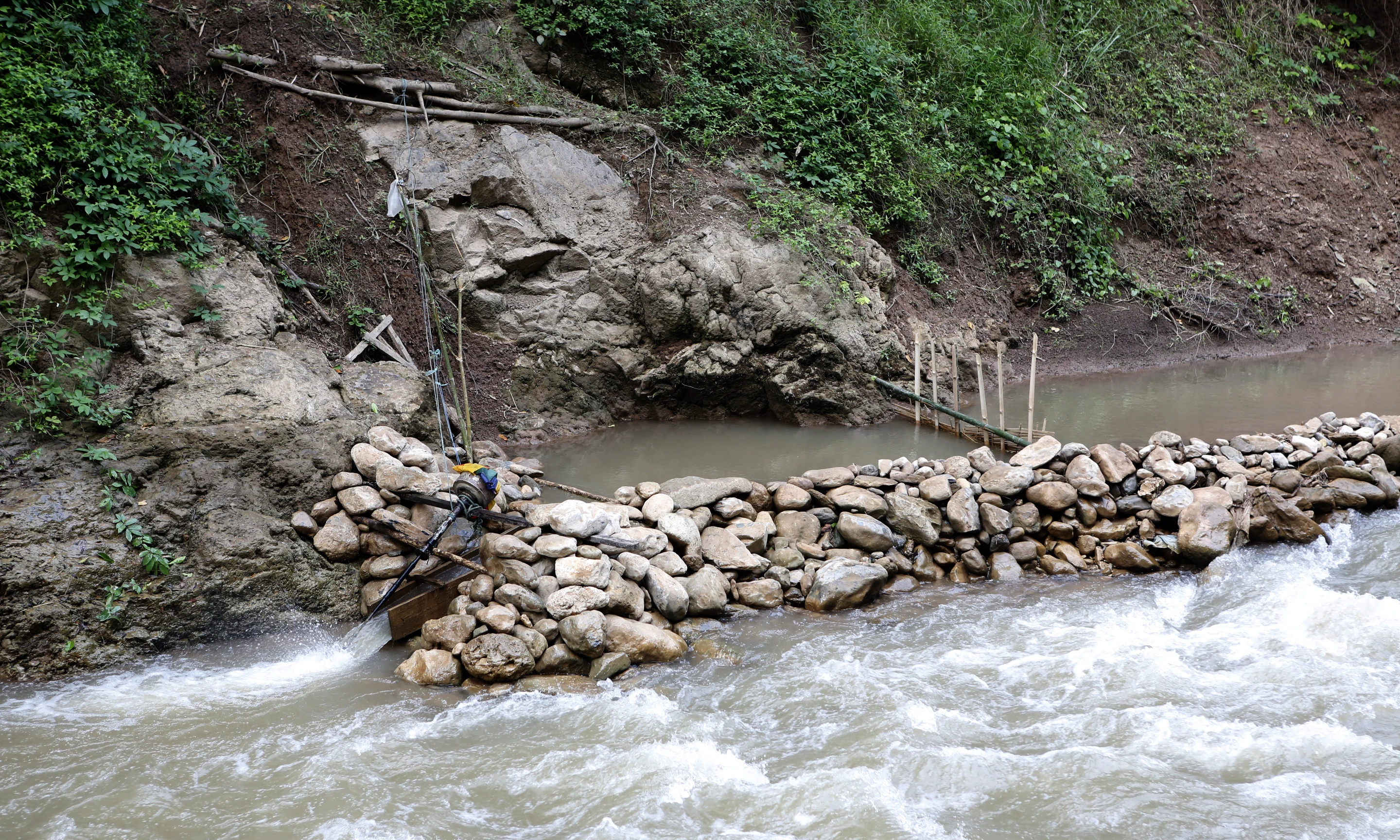It's only in the last few years that villagers have developed their own micro-hydro-electricity schemes. This generator supplies around 80 watts of power to one household. Each of the nearby streams had multiple such generators, each supplying one household, with the cables stretched for hundreds of metres across the top of the jungle canopy.