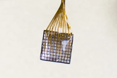 The procedure involves implanting four microelectric arrays, about half the size of a shirt button, into the areas of the brain associated with feeling in the fingers and palm