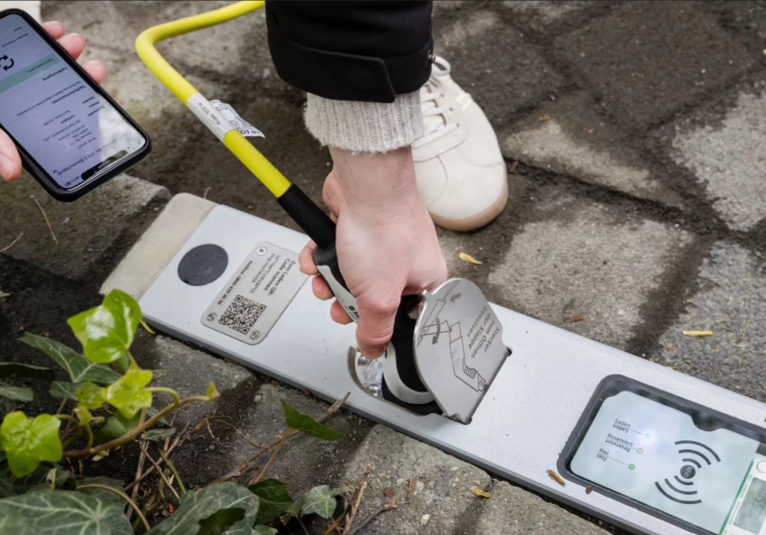 The grid-connected Curb Charger can be activated using a smartphone app, before plugging in and topping up