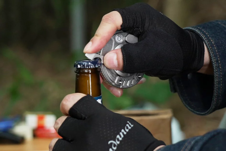 The bottle opener in use