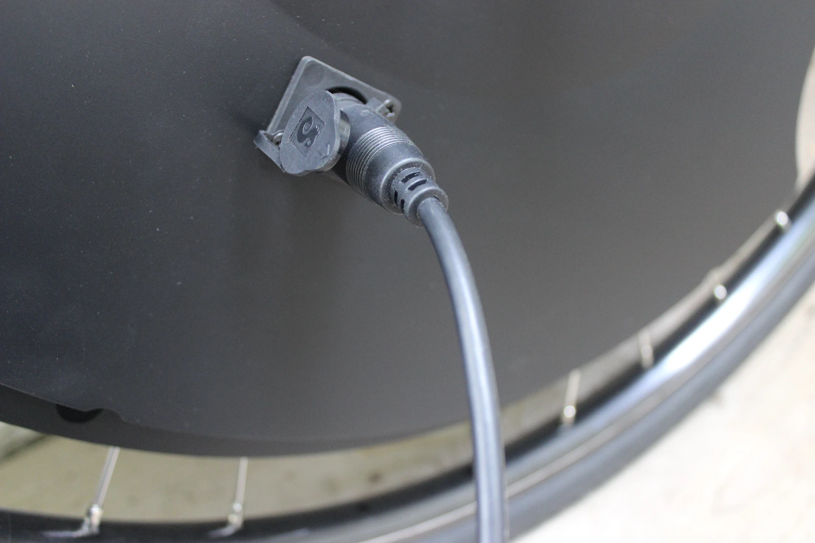 The Electron Wheel's battery pack is charged via a port in the housing