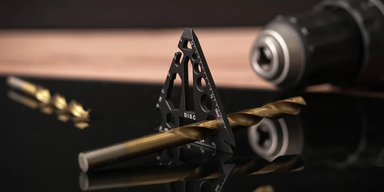Triangle multitiool has a range of drilling guide holes