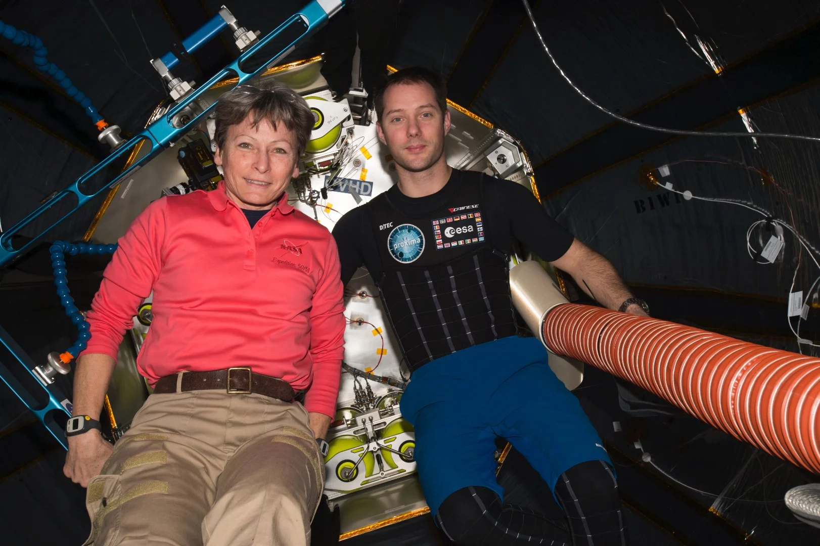 NASA's Peggy Whitson and ESA's Thomas Pesquet, installing sensors inside BEAM