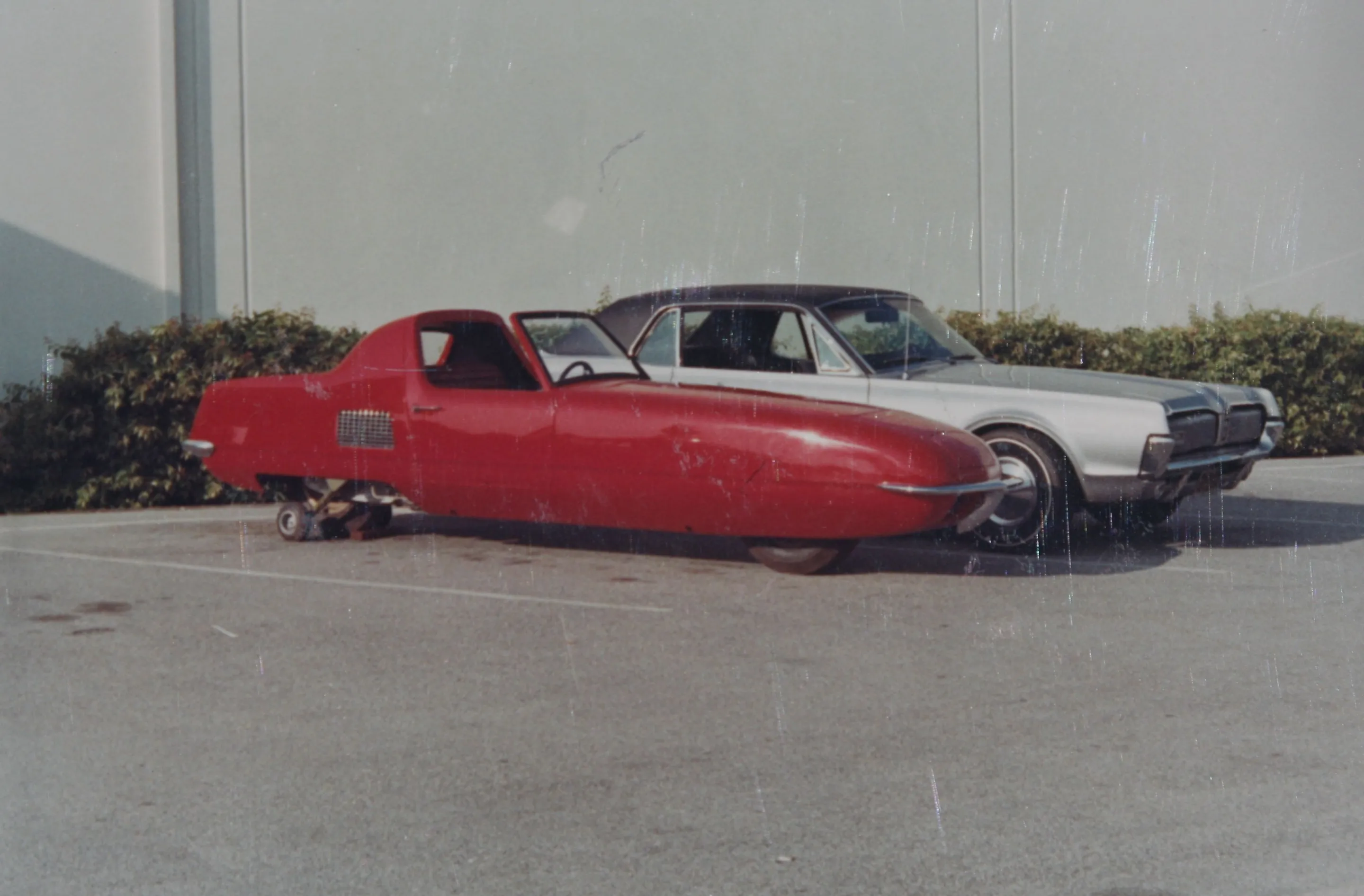 The Gyro-X beside a slightly less "unusual" car