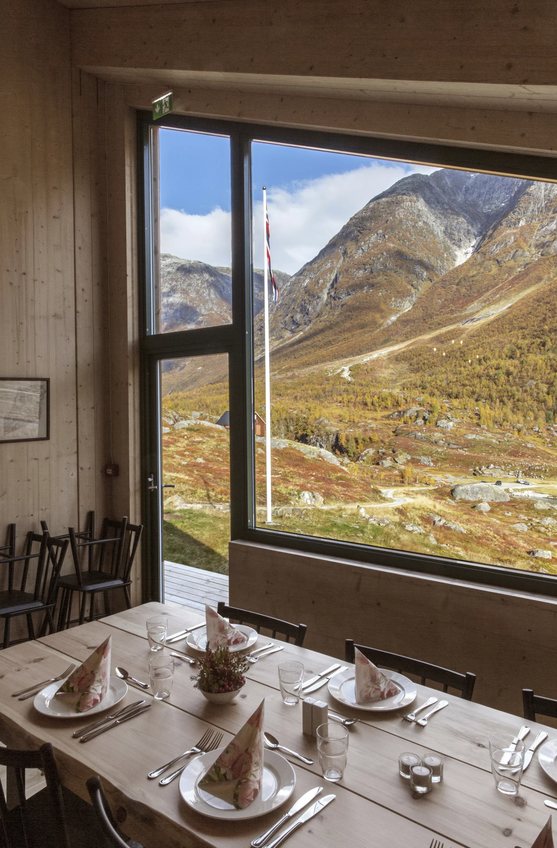 Tungestølen's mess hall cabin allows visitors to gaze out at the stunning vistas as they dine