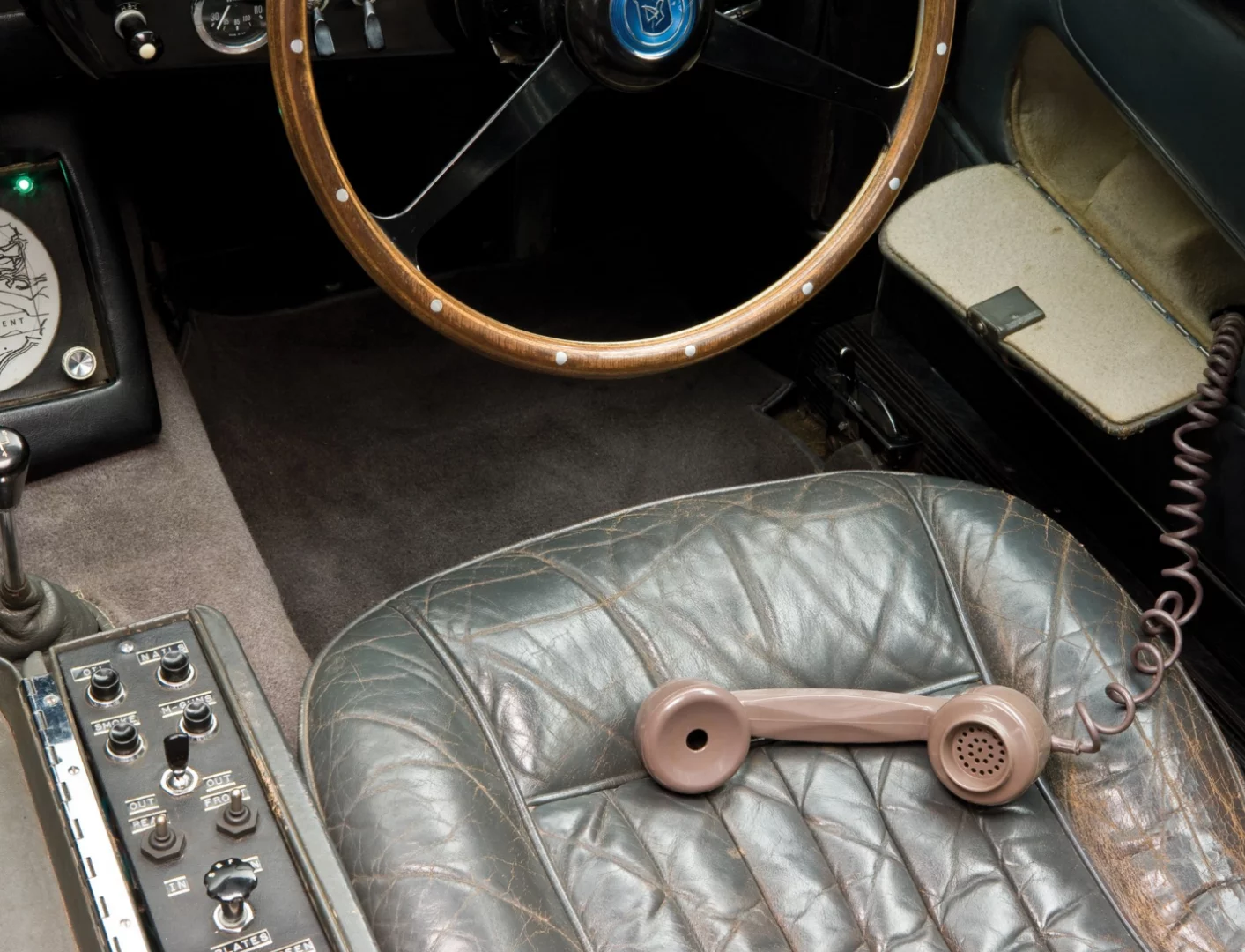 One of the original Goldfinger prop cars: phones had curly cords back then