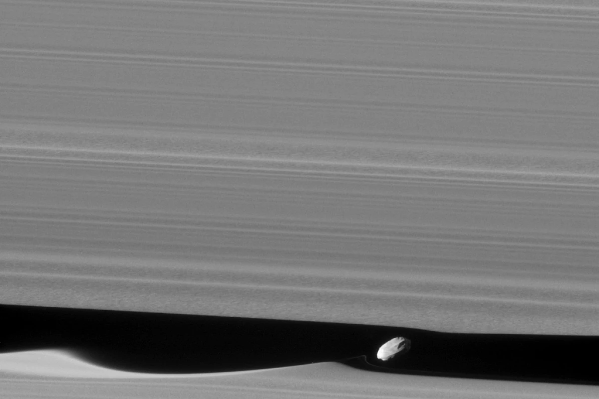 A closer look at Daphnis' effect on Saturn's rings