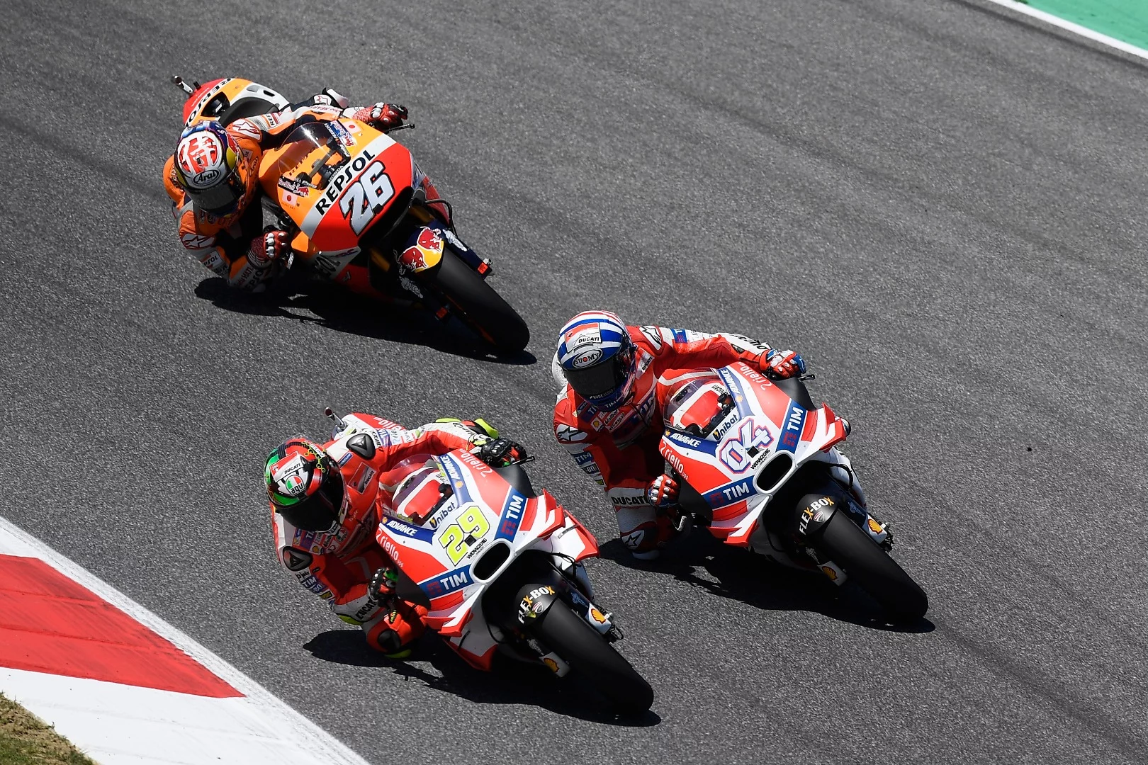 Ducati riders Andrea Iannone (#29) and Andrea Dovizioso (#4) often choose different wing configurations, while Dani Pedrosa (#26) rarely uses them on his Honda RC213V