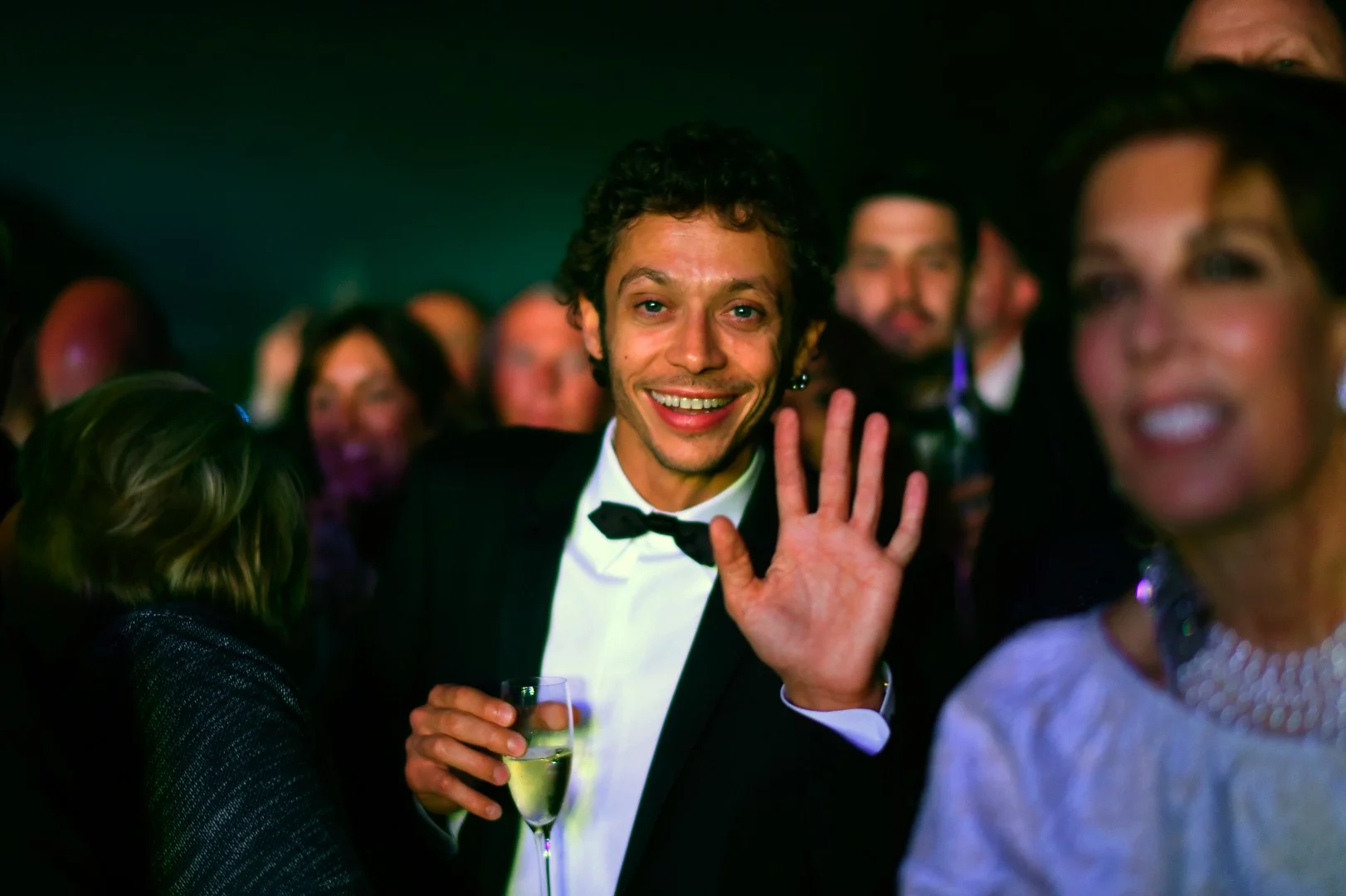 "What do you call a motorcyclist in a suit?" The old joke's punchline usually goes along the lines of "The defendant." In this case it couldn't be further from the truth. Fresh from winning the Dutch TT that afternoon, Valentino Rossi made an impressive entrance to the Saturday evening gala dinner and ball on the Saturday evening at Lord March's grand estate