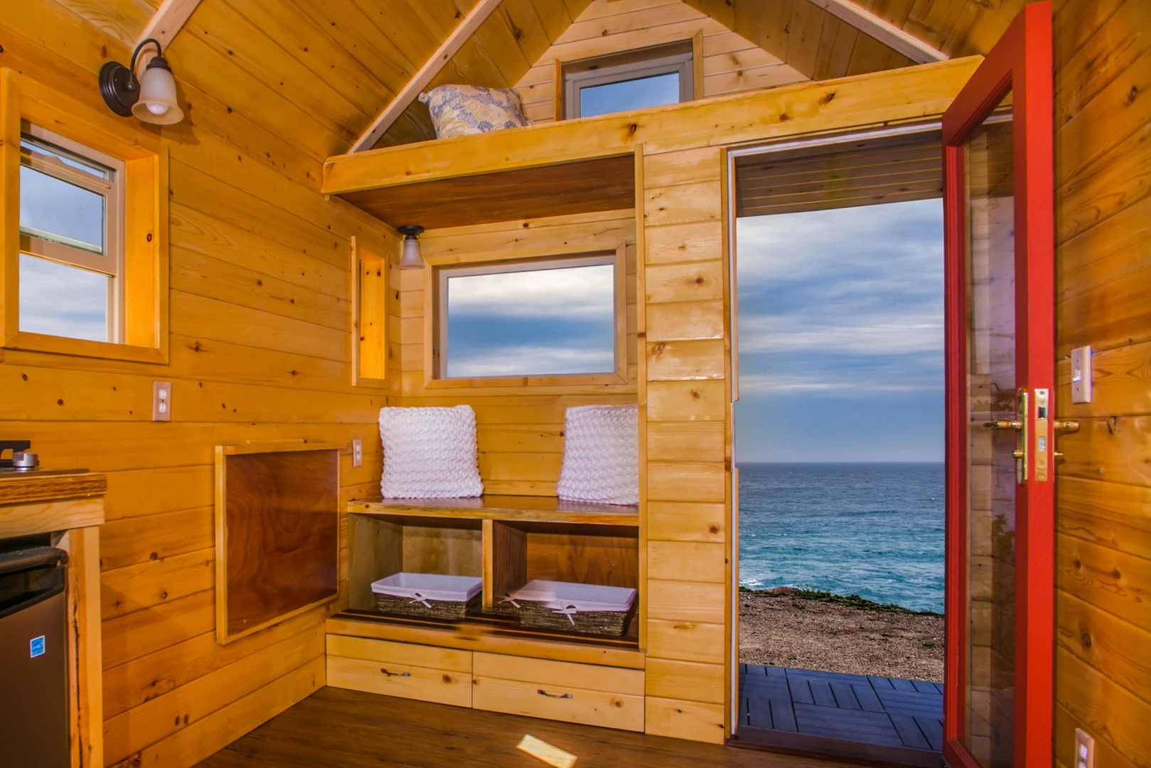 Siding comes in the form of Newtechwood, which is made from reclaimed wood fibers and recycled plastic bottles, and requires no maintenance