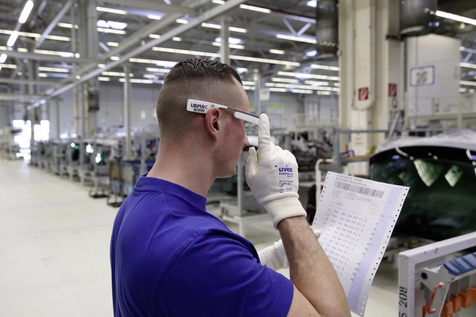 The glasses present relevant information within the user's field of vision, and have an integrated barcode reader that identifies whether or not the correct parts have been taken from storage locations
