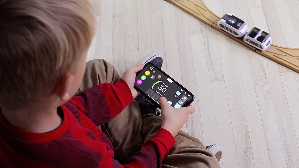 The intelino smart train can be used with traditional wooden tracks and programmed and controlled via a companion app