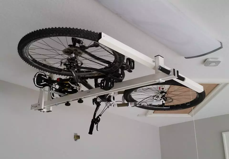 The flat-bike-lift utilizes pneumatic and hydraulic pistons, to make the pushing and pulling easier