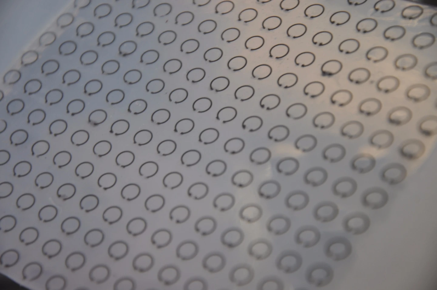 Flexible and tunable meta-skin with rows of split ring resonators
