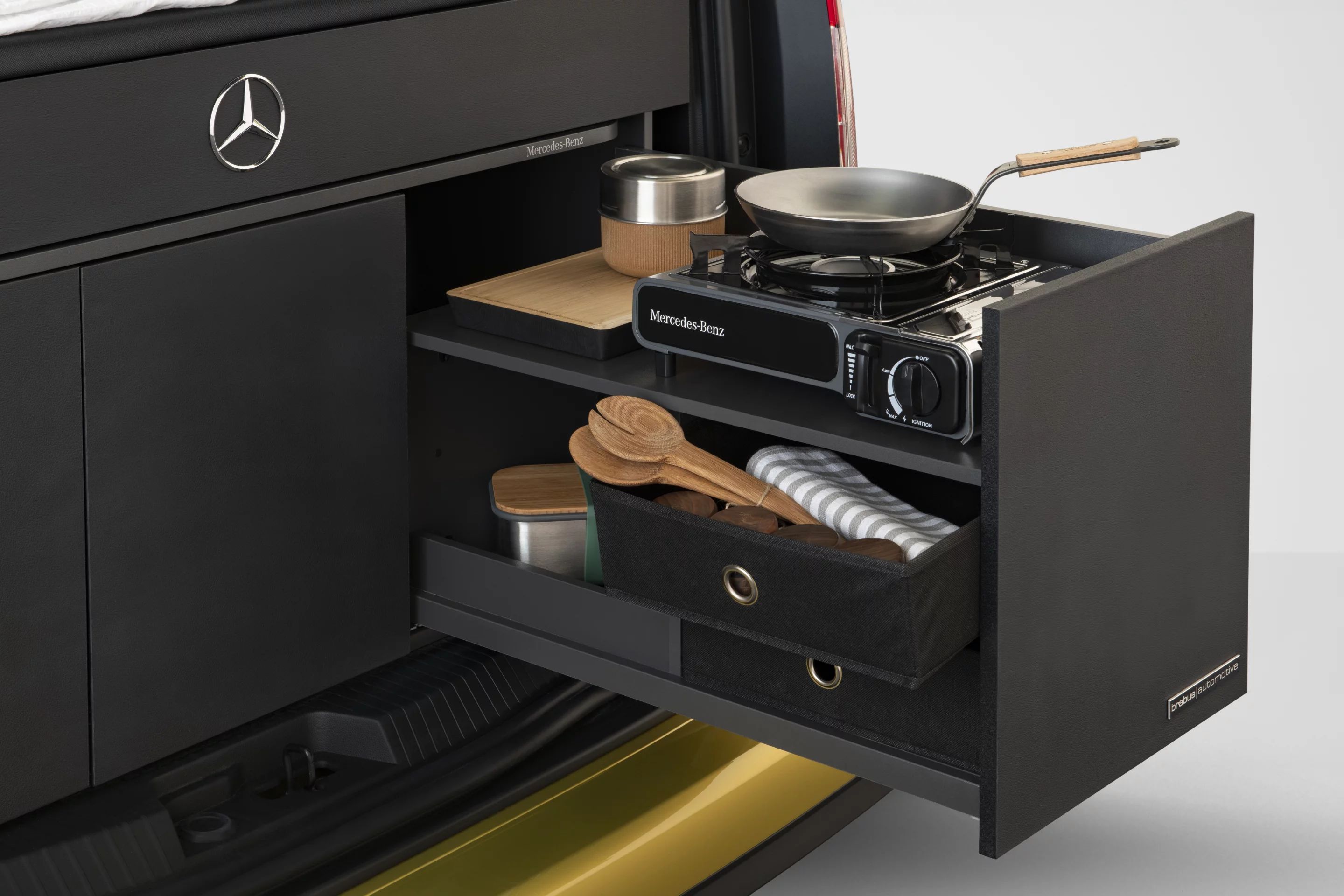 The module kitchen also includes space to store utensils and cooking tools