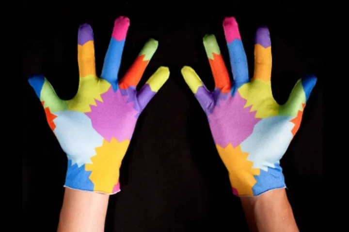 MIT researchers have unveiled a cheap and easy to use gesture recognition system which uses a colored glove, a webcam and some software with positive results