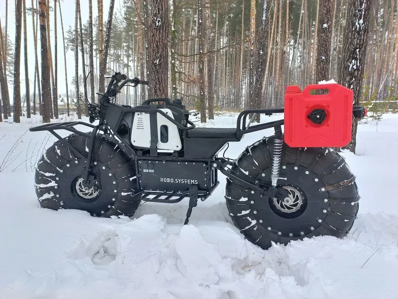 A 1.6-kWh battery pack will get you around over short distances, but a range-extending generator and up to 40 liters of fuel can boost that to the extreme