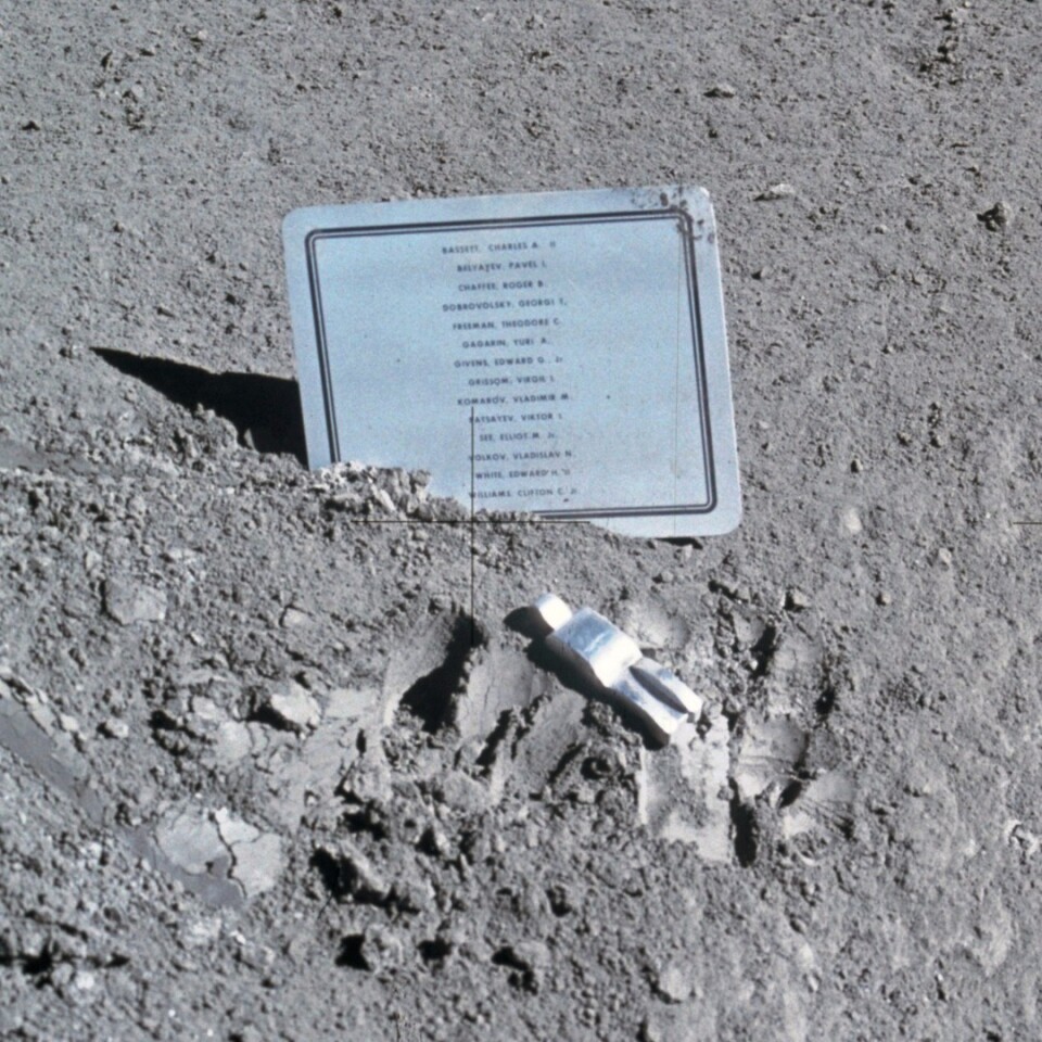Photo of the Fallen Astronaut and accompanying name plaque left on the moon during the Apollo 15 mission