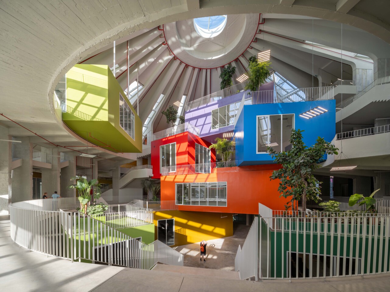 The Pyramid of Tirana's renovation involved MVRDV installing multiple box-shaped structures inside, around and on top of the pyramid