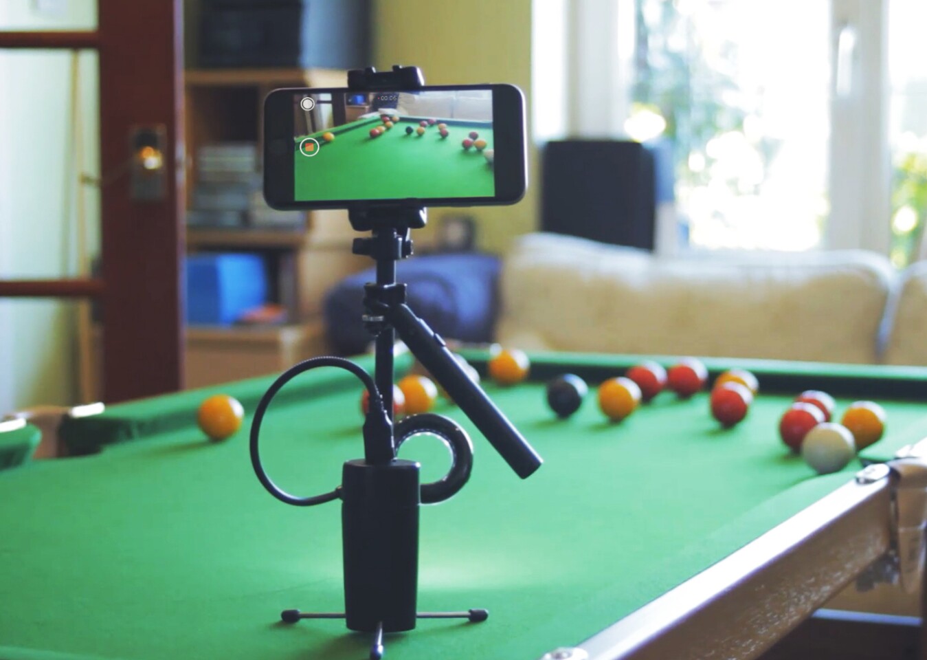 The base of the MiniRig stabilizer features tripod legs